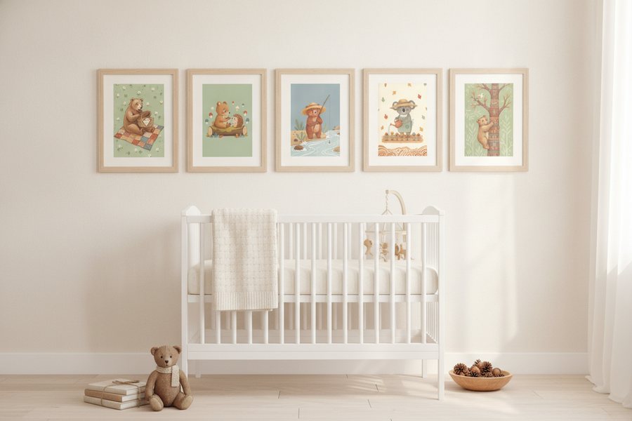 The five free bear prints framed in a row above a white cot