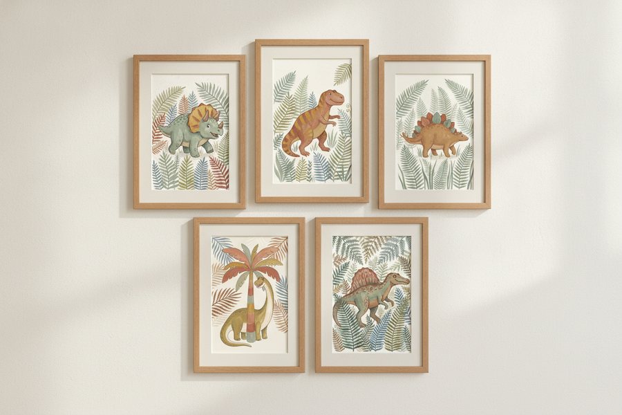 The five free dinosaur prints hung as an asymmetric gallery wall